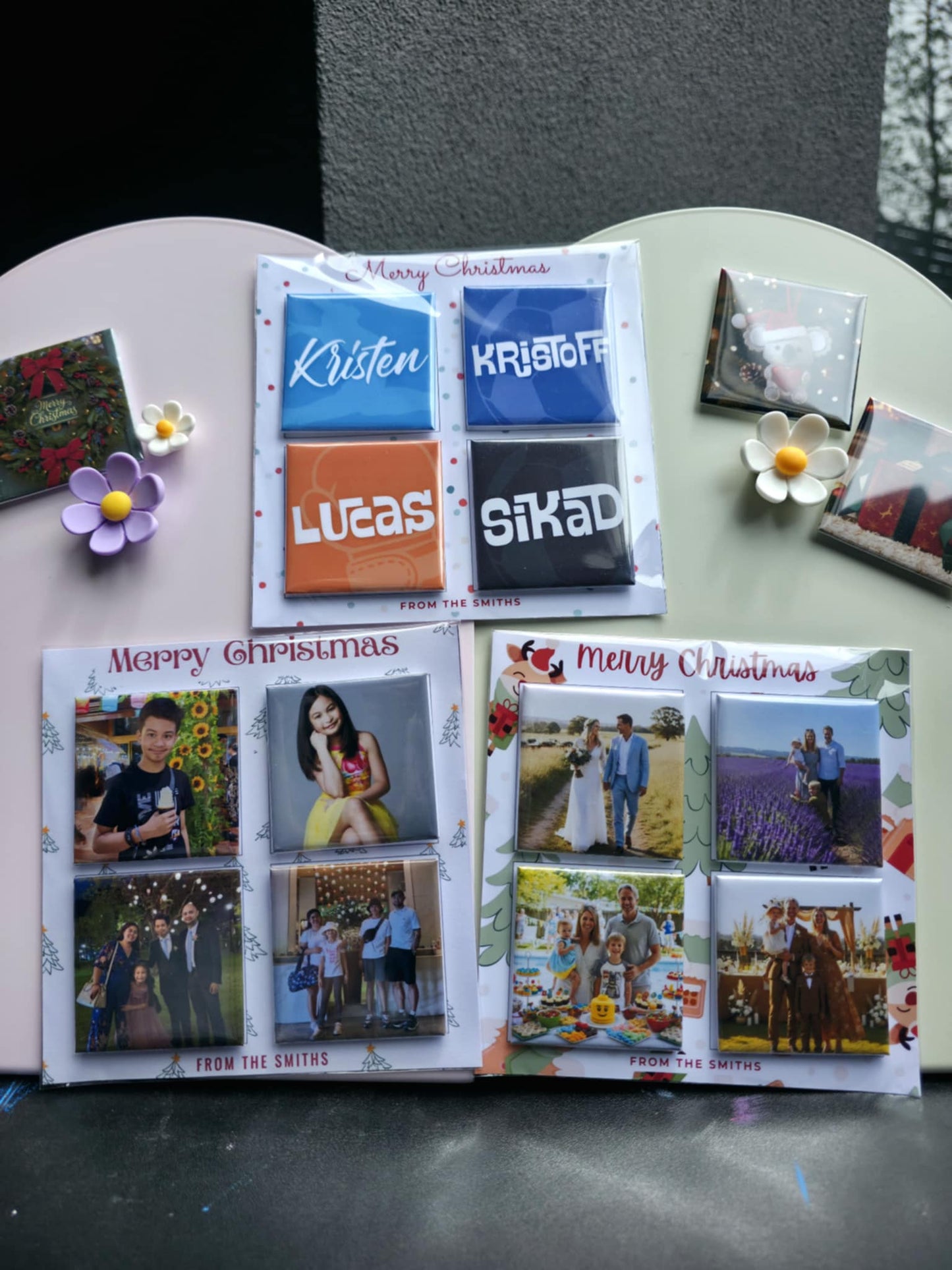 Collection of photo albums with various photos and text on a surface.