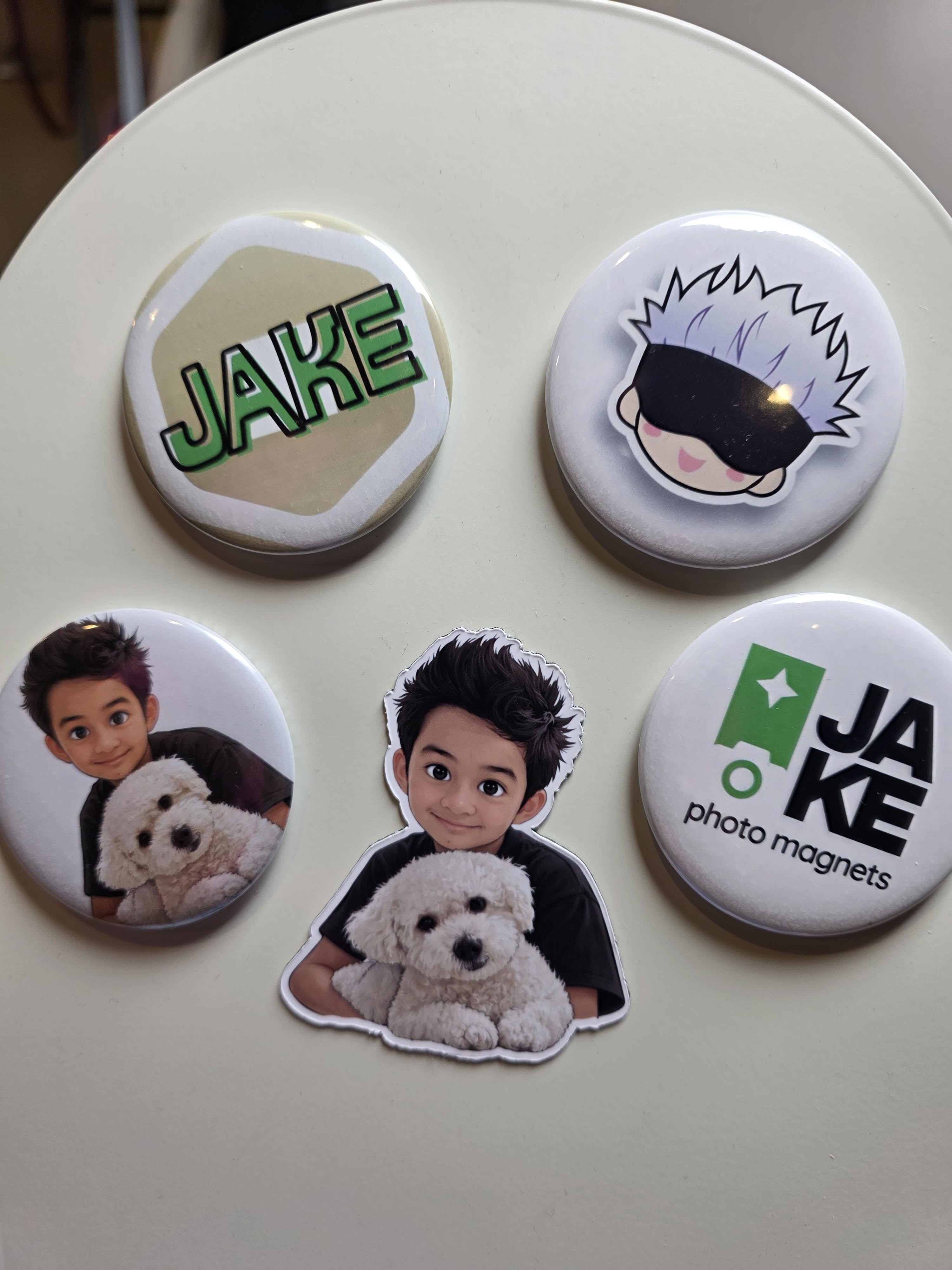 Set of photo magnets featuring a person and a dog, with 'JAKE' branding.