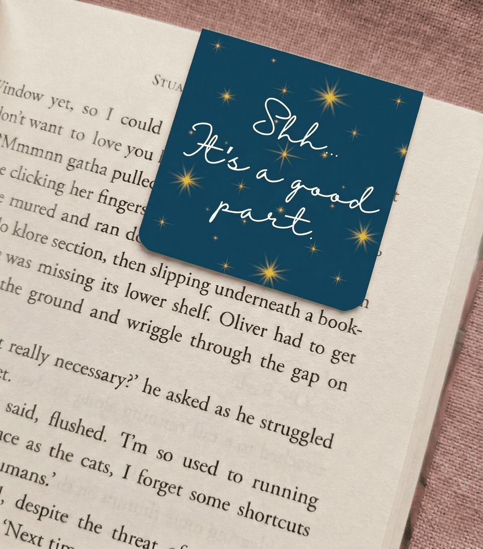 Bookmark with 'Shh... It's a good part.' text on a book page