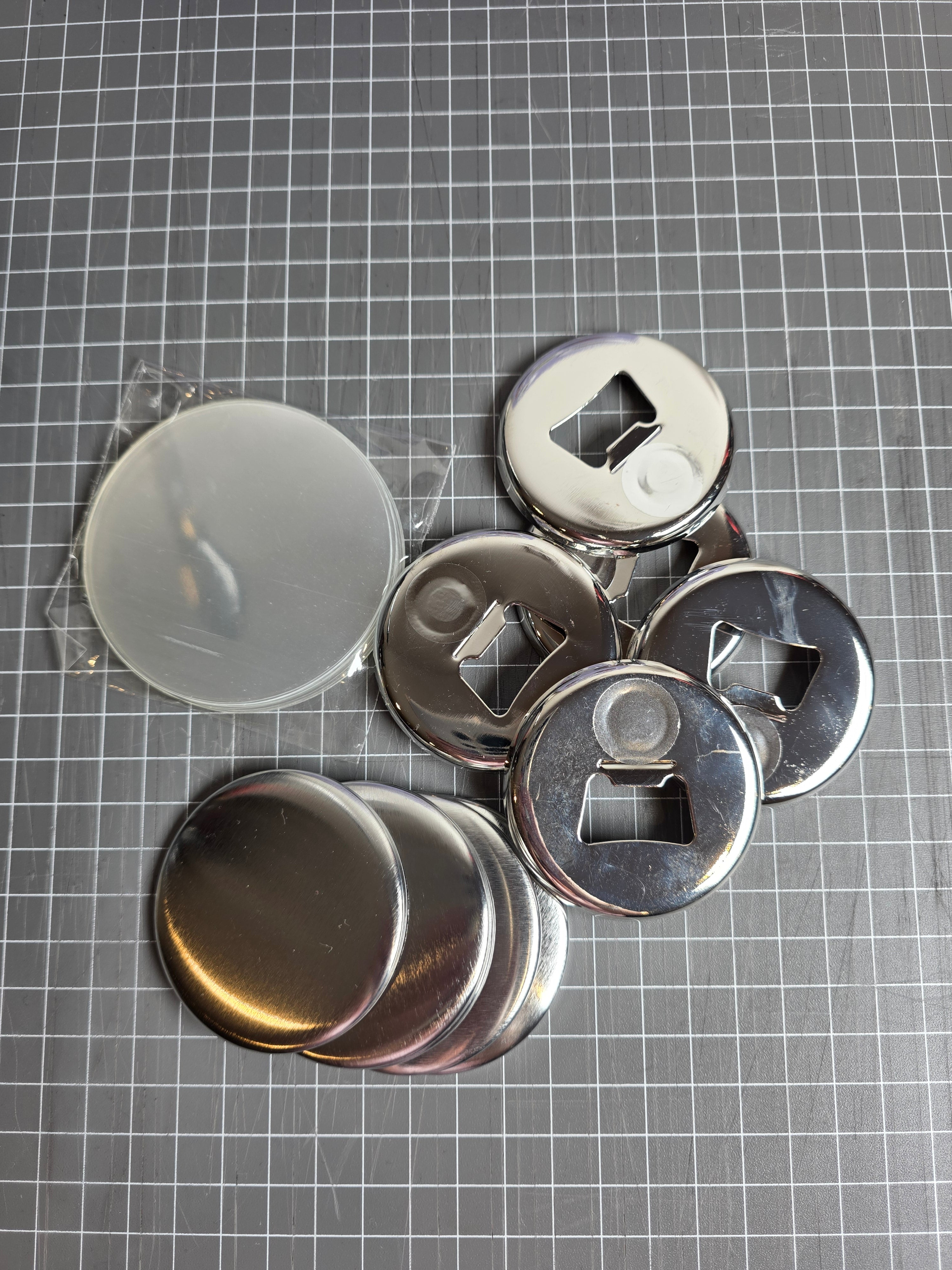 Metallic buttons on a grid background