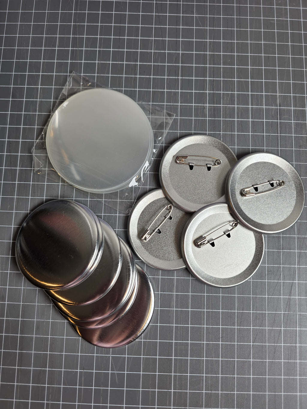 Metallic buttons on a grid background