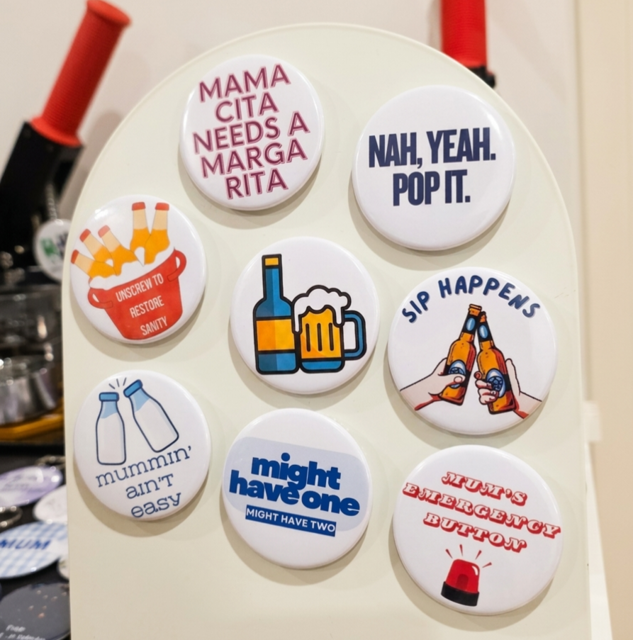 Set of humorous magnetic bottle openers with various sayings on a white background