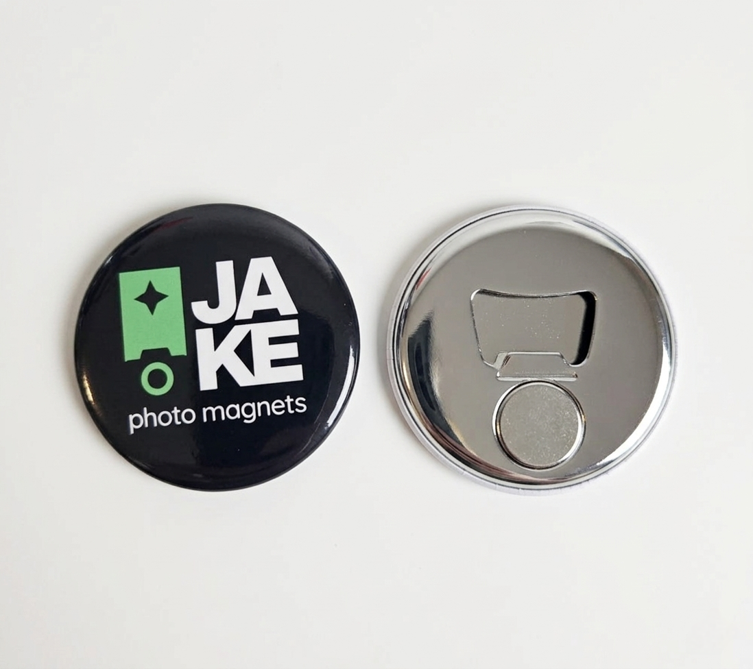 Two photo magnets, one black with 'JAKE photo magnets' text and logo, the other silver with a bottle opener design, on a white background.